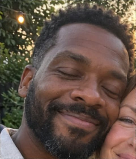 Man, eyes shut